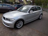 Second-hand BMW 118 143 CP (105 kW) 2009 Argintiu Hatchback