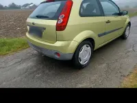 Używany Ford Fiesta 60 KM (44 kW) 2007 Żółty Hatchback