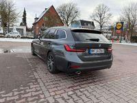 Gebraucht BMW 330e 184 PS (135 kW) 2021 Mineralgrau Kombi