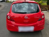 Używany Opel Corsa 101 KM (74 kW) 2013 Czerwony Hatchback