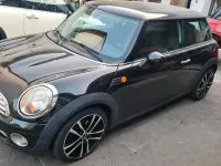 Gebraucht Mini Cooper 122 PS (89 kW) 2009 Schwarz Kleinwagen