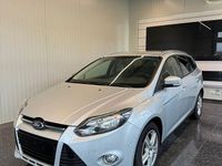 Second-hand Ford Focus Titanium 140 CP (102 kW) 2012 Argintiu Berlinǎ