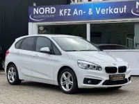Gebraucht BMW 218 Active Tourer Basis 150 PS (110 kW) 2014 Weiß Van / Kleinbus