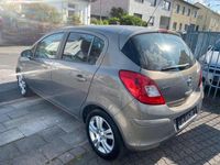 Gebraucht Opel Corsa Active 95 PS (69 kW) 2013 Muskatgrau/muskat braun(m2) Kleinwagen