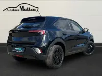 Gebraucht Opel Mokka-e GS Line 100 kW (136 PS) 2024 Lackierung schwarz perla nera/ SUV