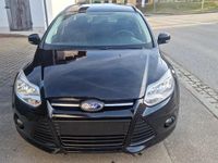 Gebraucht Ford Focus Trend 125 PS (91 kW) 2014 Pantherschwarz metallic Kombi