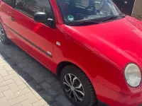 Używany VW Lupo 50 KM (36 kW) 2000 Czerwony Hatchback