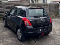 Gebraucht Suzuki Swift 75 PS (55 kW) 2009 Schwarz Kleinwagen