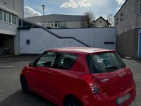 Second-hand Suzuki Swift 92 CP (67 kW) 2009 Roșu Hatchback