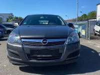 Używany Opel Astra Selection 90 KM (66 kW) 2009 Szary Sedan/Limuzyna