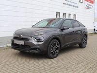 Gebraucht Citroën e-C4 Shine 100 kW (136 PS) 2023 Platinumgrau Limousine