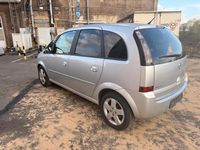 Second-hand Opel Meriva 105 CP (77 kW) 2007 Argintiu Monovolum