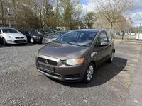 Gebraucht Mitsubishi Colt 95 PS (69 kW) 2011 Granitbraun (m) Kleinwagen