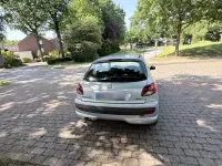Gebraucht Peugeot 206+ 60 PS (44 kW) 2010 Silber Kleinwagen