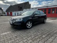 Second-hand VW Jetta 140 CP (102 kW) 2006 Negru Berlinǎ