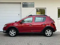 Gebraucht Dacia Sandero Prestige 90 PS (66 kW) 2016 Feuerrot SUV