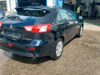 Second-hand Mitsubishi Lancer 109 CP (80 kW) 2010 Negru Berlinǎ