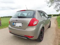 Używany Kia Ceed 116 KM (85 kW) 2013 Beżowy Hatchback