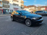 Gebraucht BMW 116 116 PS (85 kW) 2010 Schwarz Kleinwagen