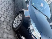 Używany Opel Insignia 200 KM (147 kW) 2012 Purpurowy Sedan/Limuzyna