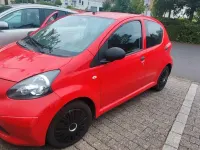 Gebraucht Toyota Aygo 68 PS (50 kW) 2008 Rot Kleinwagen