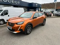 Gebraucht Peugeot e-2008 Active 100 kW (136 PS) 2022 Met. orange fusion SUV
