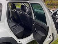 Second-hand Dacia Duster 110 CP (80 kW) 2011 Alb SUV