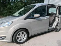 Gebraucht Ford Tourneo Courier 75 PS (55 kW) 2014 Silber Van / Kleinbus