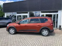 Gebraucht Dacia Jogger Expression 110 PS (80 kW) 2024 Terracottabraun metallic Van / Kleinbus