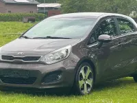 Gebraucht Kia Rio Attract 86 PS (63 kW) 2013 Braun Limousine