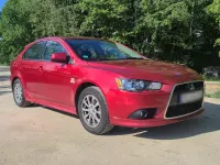 Gebraucht Mitsubishi Lancer 143 PS (105 kW) 2010 Rot Limousine