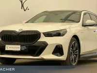 Gebraucht BMW 550e Sport Line 490 PS (360 kW) 2025 Alpinweiß uni Kombi