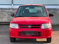 Gebraucht Daihatsu Cuore 58 PS (42 kW) 2000 Rot Kleinwagen