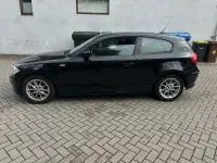 Gebraucht BMW 116 122 PS (89 kW) 2010 Schwarz ii Kleinwagen