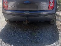 Usado Nissan Micra 65 HP (47 kW) 2006 Cinzento Citadino