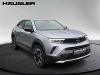 Gebraucht Opel Mokka-e Ultimate 100 kW (136 PS) 2022 Quarz silber (metallic) SUV