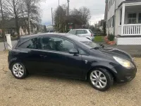 Używany Opel Corsa 69 KM (50 kW) 2010 Czarny Hatchback