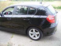 Gebraucht BMW 116 122 PS (89 kW) 2009 Schwarz Kleinwagen