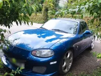 Occasion Mazda MX5 140 ch (102 kW) 1999 Bleue Cabriolet