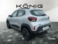 Gebraucht Dacia Spring Extreme 47 kW (65 PS) 2023 Diamantsilbergrau Kleinwagen
