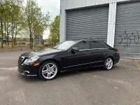 Używany Mercedes E500 AMG 388 KM (285 kW) 2011 Czarny Sedan/Limuzyna