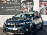 Gebraucht Dacia Sandero Expression 91 PS (66 kW) 2024 Grün (metallic) Kleinwagen