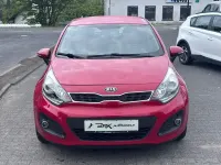 Używany Kia Rio 109 KM (80 kW) 2012 Czerwony Sedan/Limuzyna