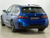 Gebraucht BMW 330e M Sport 292 PS (214 kW) 2022 Portimao blau m Kombi