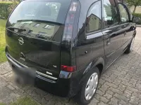 Second-hand Opel Meriva 105 CP (77 kW) 2009 Negru Monovolum