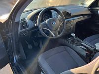 Gebraucht BMW 118 143 PS (105 kW) 2010 Schwarz Kleinwagen