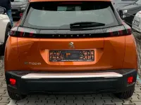 Gebraucht Peugeot e-2008 Active 100 kW (136 PS) 2023 Orange SUV