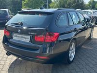 Second-hand BMW 330 Performance 258 CP (189 kW) 2014 Negru Break