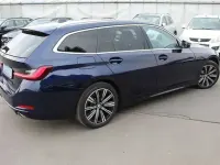 Gebraucht BMW 330 Sport Line 286 PS (210 kW) 2023 Tansanitblau ii metallic Kombi