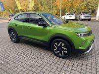 Gebraucht Opel Mokka-e drive 100 kW (136 PS) 2022 Ikone grün metallic SUV